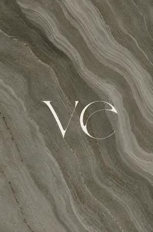 Elegant logo on textured stone surface