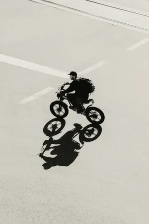 Rider crossing an empty street